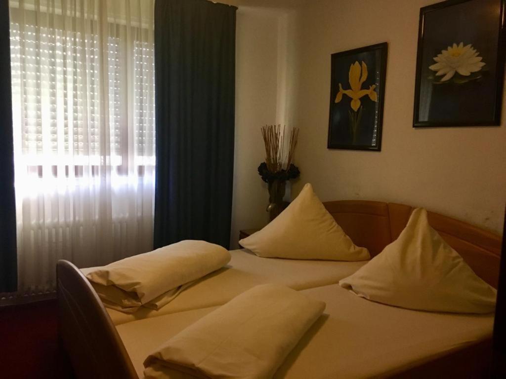 דוסנהיים Hotel Heidelberger Tor מראה חיצוני תמונה